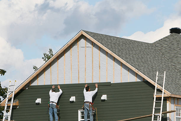 Professional Siding Installation technician working in Oaks, PA